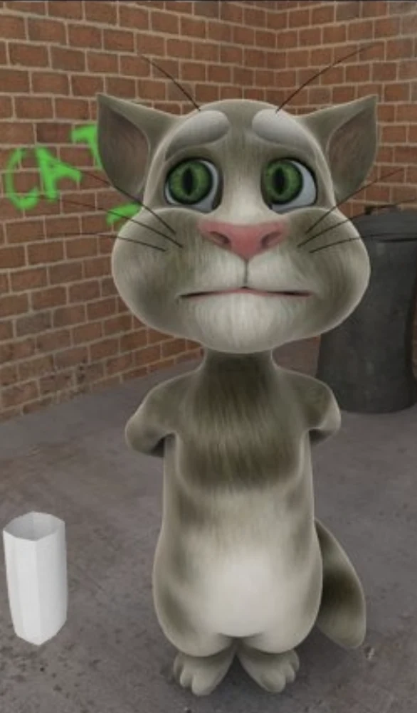 The cat in his alley, with a glass of milk, as he looked in 2010